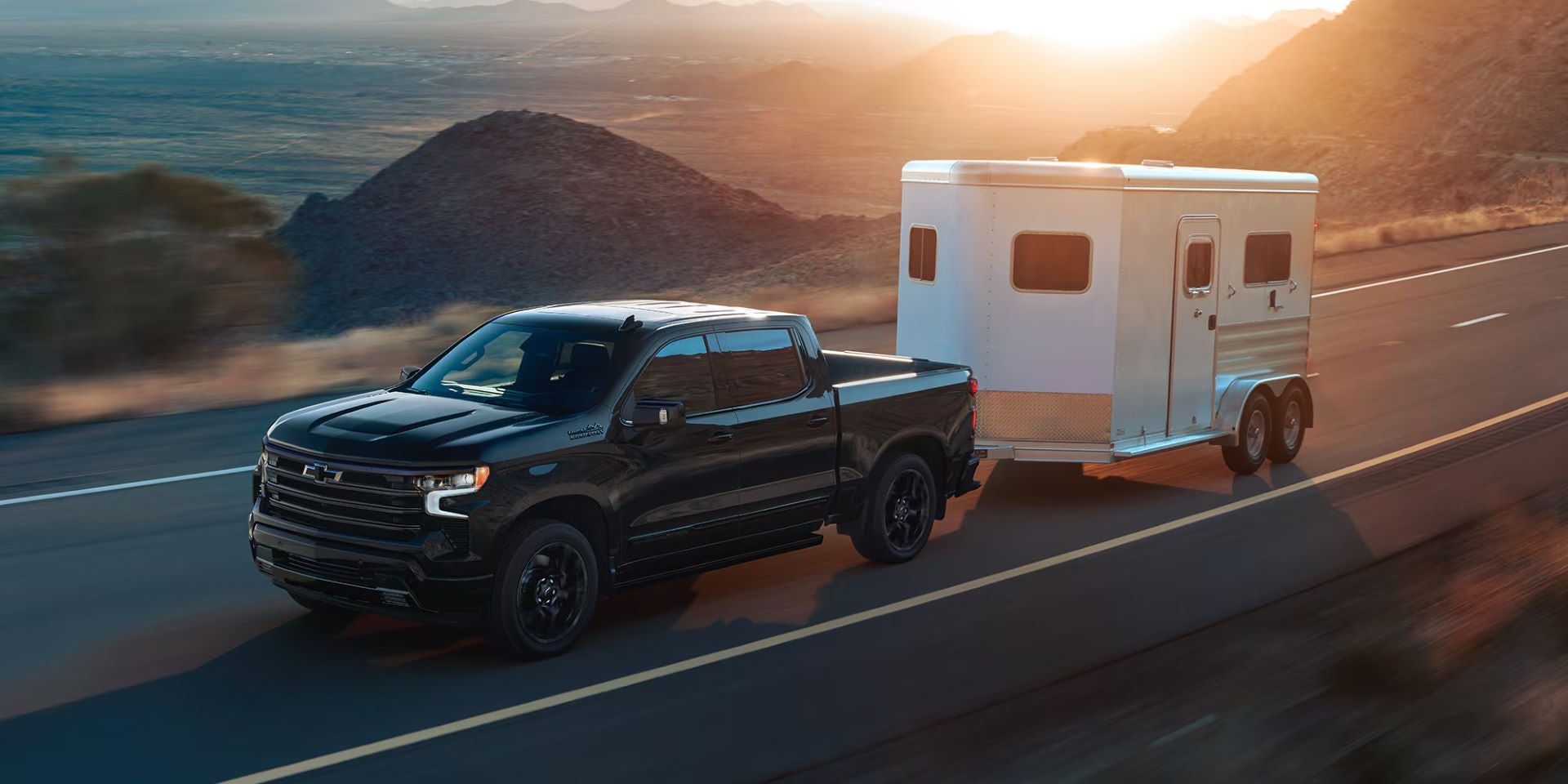 chevrolet silverado 1500 towing a trailer img
